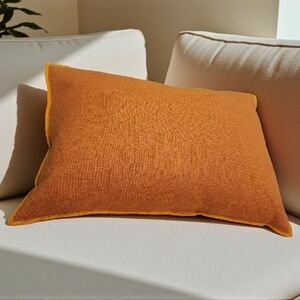 Crate and Barrel 22"x15" Merrow Stitch Cotton Throw Pillow in Amber